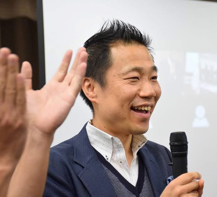 セミナーで講話する小澤陽一